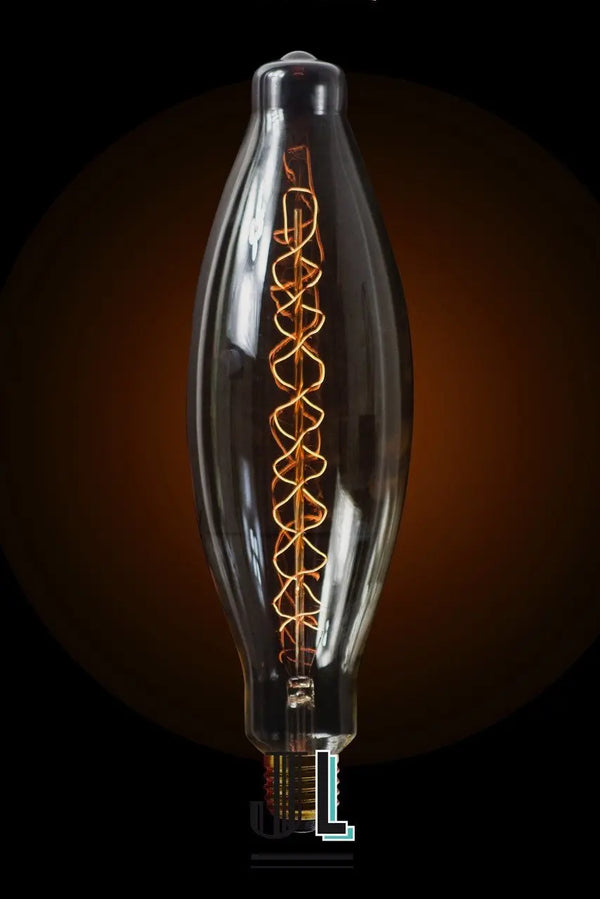 Ampoule Navett E27 en forme de navette allongée, long filament spiralé allumé, vue de face sur fond noir